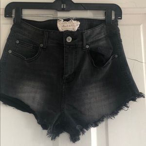Mid rise washed black shorts